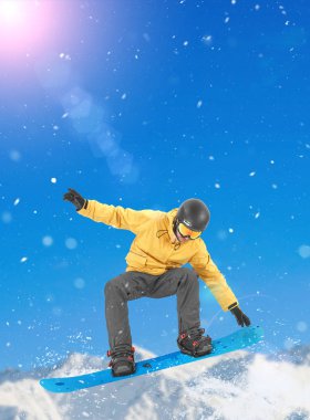Snowboarder performing a tail grab clipart