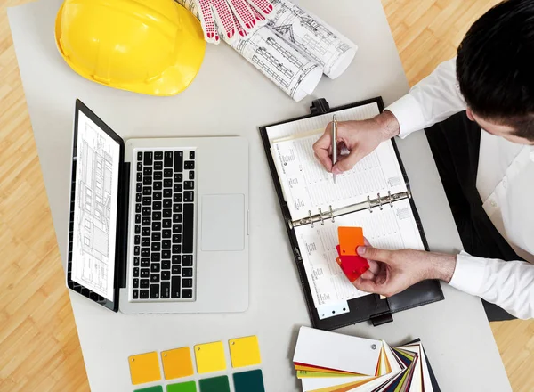 Man Color Swatches Desk — Stock Photo, Image