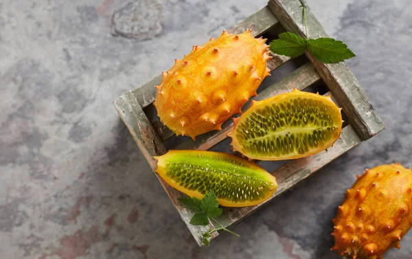 Kiwano fruit on a crate