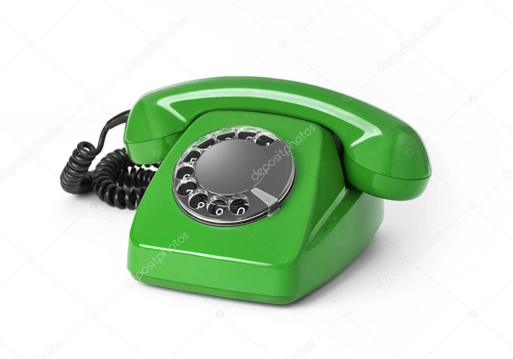 Vintage telephone isolated on white