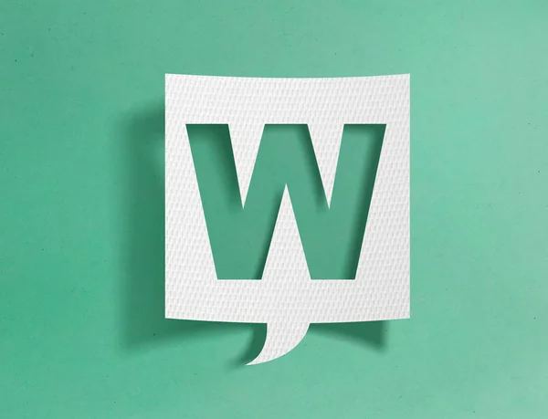 Speech bubble with letter W on green background