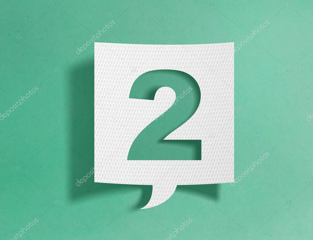Speech bubble with number 2 on green background