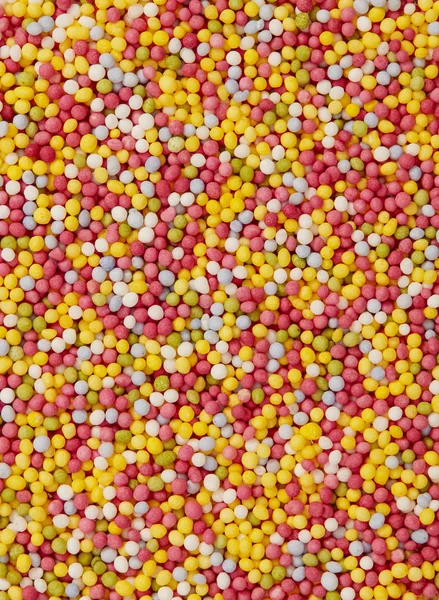 Colored sprinkles background — Stock Photo, Image
