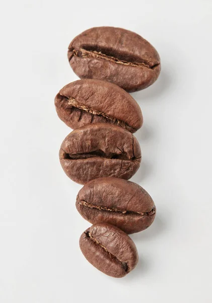 Roasted coffee on white — Stock Photo, Image