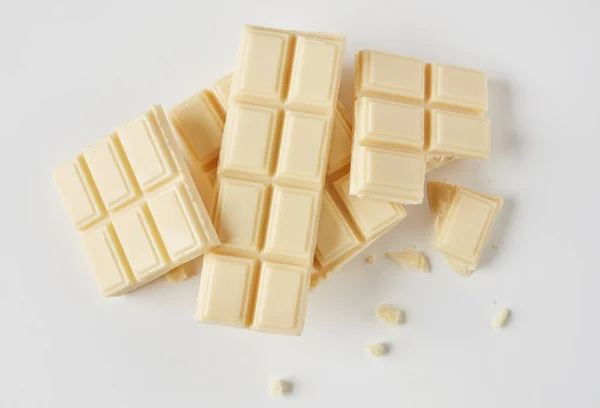 Chocolate blanco sobre gris — Foto de Stock