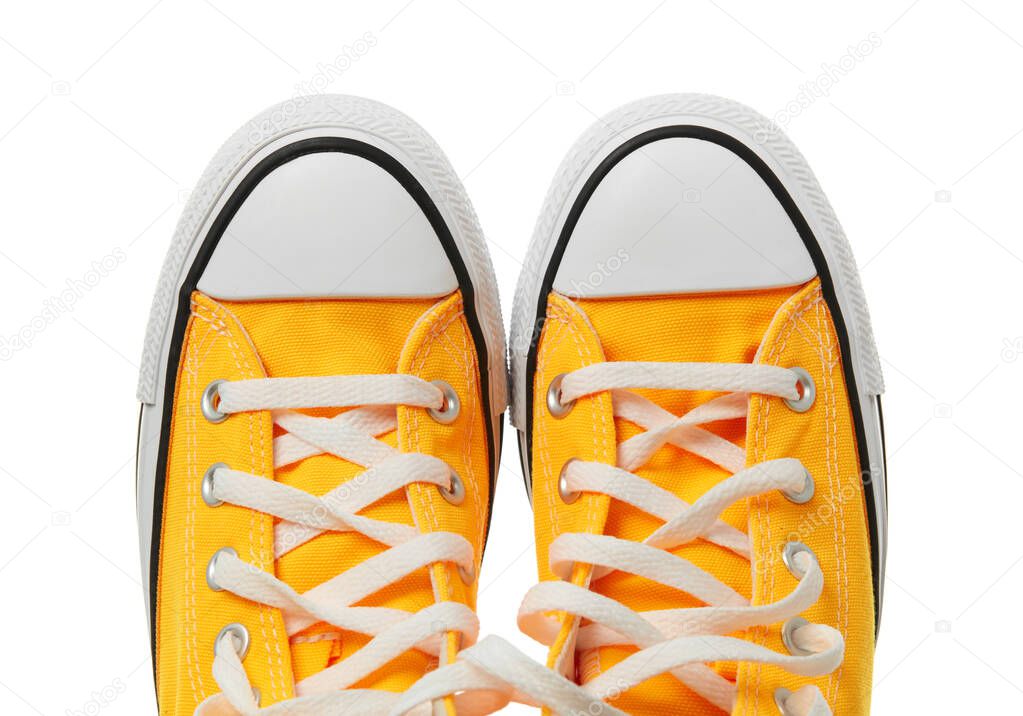Yellow sneakers isolated on white