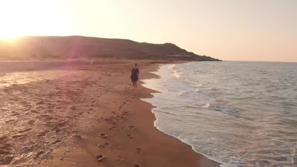 Happy woman run at the beach — Stock Video