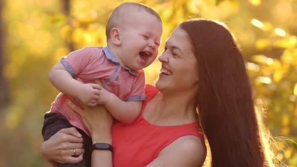 Happy mother play with her son — Stock Video