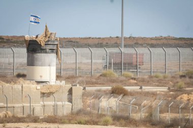 Military position at the Kerem Shalom border crossing to the Gaza strip. Israel Gaza border Israel Egypt border, Gaza Egypt border stock image. Kerem Shalom terminal, Israel, Circa September 2013. clipart