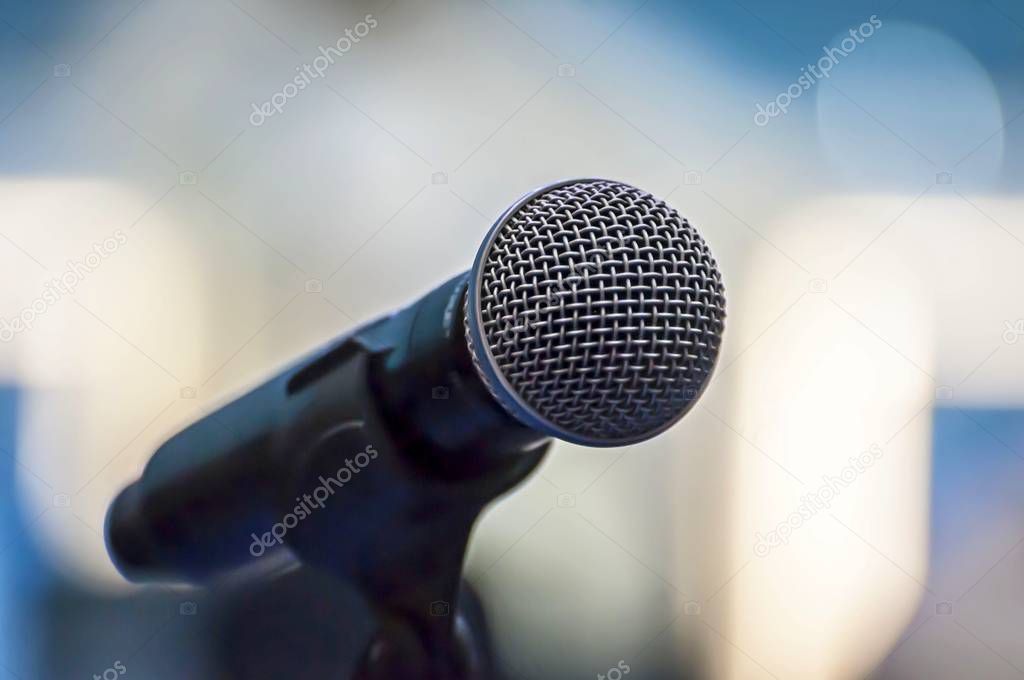 Microphone isolated closeup illustrative image for conference, convention, musical concert, public performance, show, music recording studio concept. Freedom of speech, democracy concept image.