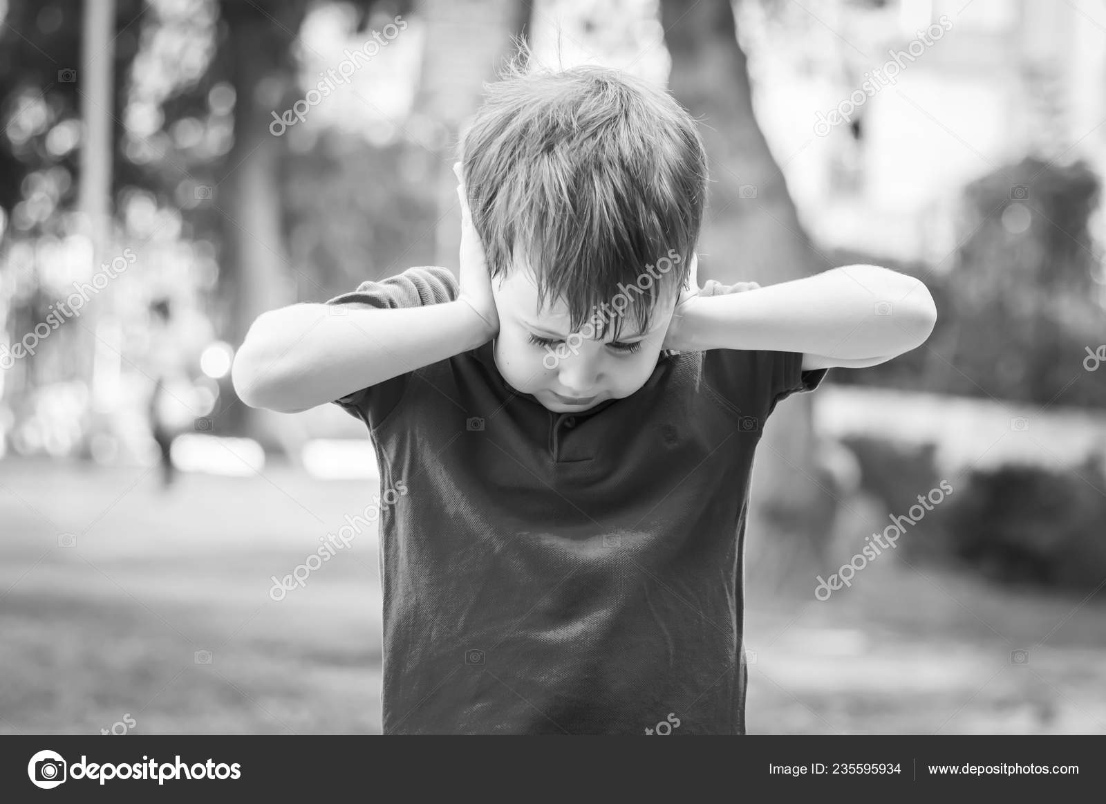 Cute Caucasian Child Closing Ears Hands Out Stress Despair Autism Stock  Photo by ©Roman_Yanushevsky 235595934