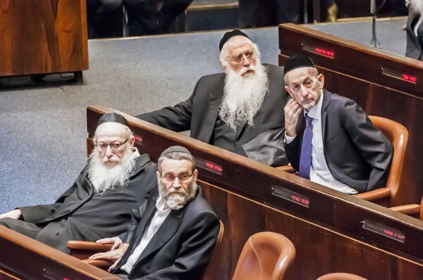 KNESSET, JERUSALEM, ISRAEL. October 3, 2019. Knesset members from a religious Ultra Orthodox faction United Torah Judaism. Top row left to right: Meir Porush, Uri Maklev, bottom row: Yaakov Litzman and Moshe Gafni.