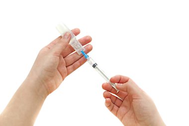 El kızı ampül ile şırınga