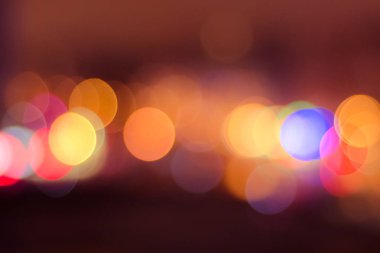 Sıcak renkli ışıklarla bulanık bokeh arkaplan resmi