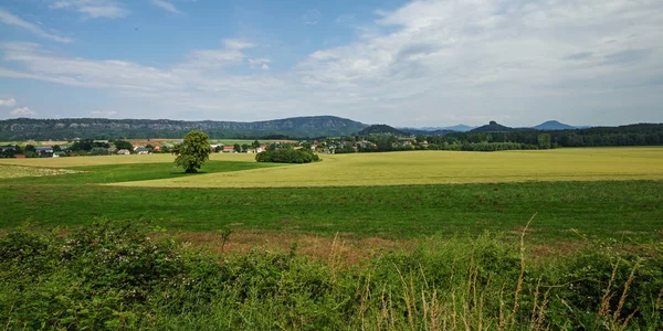 View over the fields to Zirkelstein rock — Stock Photo, Image