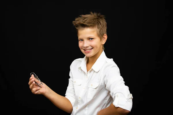 Boy in white shirt with beautiful mask amid emotion surprise joy sadness