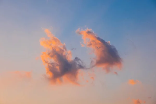 Soft, fluffy and colorful cloud formation at sunset