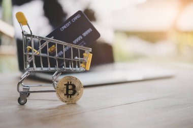 Satın Bitcoins kavramı veya kredi kartı olarak alışveriş sepeti. Online ödeme kavramı