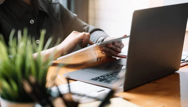 Close up a accountant working about financial at office to calculate expenses, Accounting concept — Stock Photo, Image