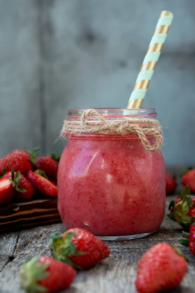 Fresh summer strawberry smoothie in a jar. Natural food. Diet. Vegetarianism