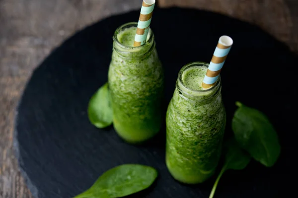 Fresh green smoothie. Natural food. Diet. Spinach puree, kiwi and banana.