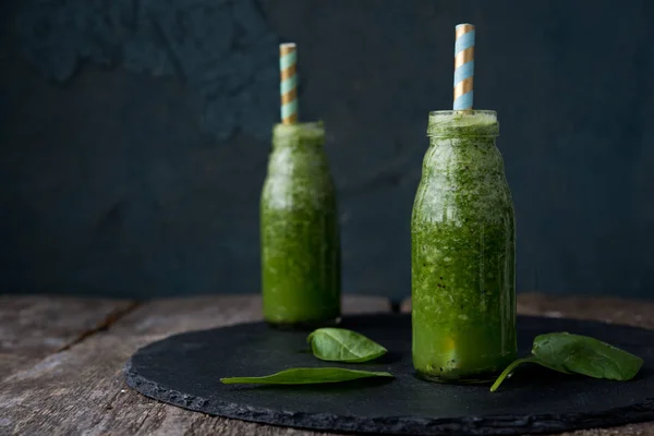 Fresh green smoothie. Natural food. Diet. Spinach puree, kiwi and banana.