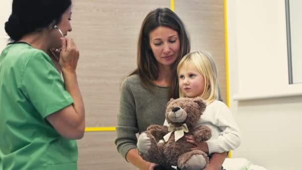 Caring Her Bear Beautiful Little Girl Sitting Lap Her Mother — Stock Video