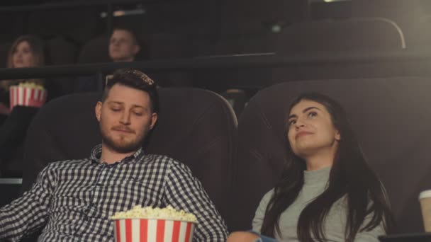 Young Guy Girlfriend Watching Movie Cinema Eating Popcorn — Stock Video