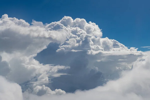 Cumulonimbus clouds formation looking from airplane window — Stock Photo, Image