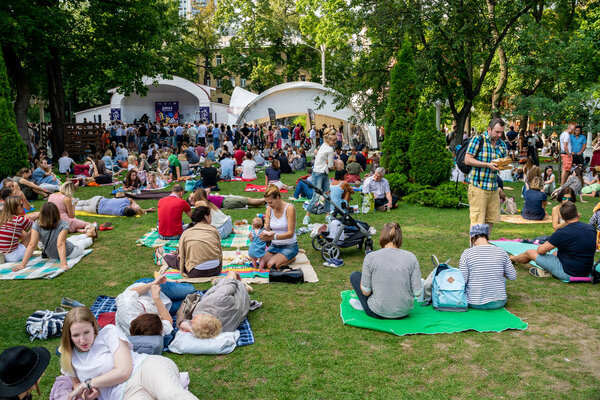 People having rest on the grass