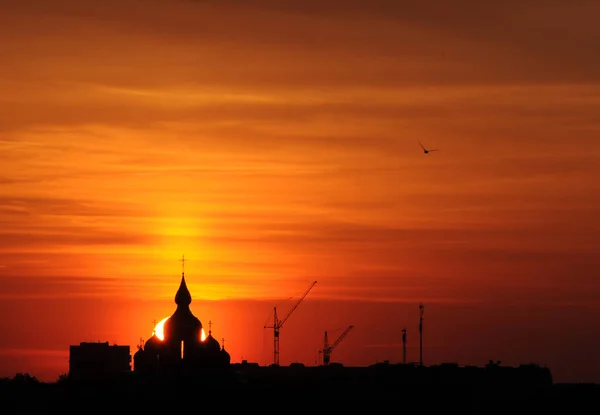 The silhouette of ortodox church in sunrise — Stock Photo, Image