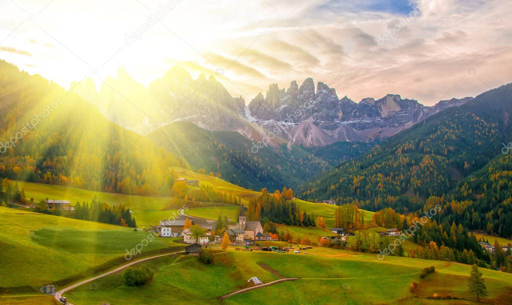 Colorful autumn scenery in Santa Maddalena village at sunrise. Dolomite Alps, South Tyrol, Italy.