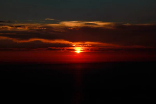 Sea, sky, sunset on horizon of mediterranean coast. Amazing sunset vibes on edge ocean. Sunrise over sea. Beautiful view, landscape and natural environment. Summer season, travel, vacation, holiday.