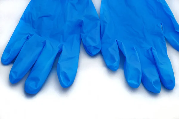 Een Paar Medisch Blauwe Latex Beschermende Handschoenen Een Witte Achtergrond — Stockfoto