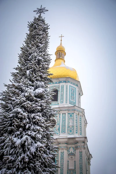 Michael's Golden Domed Cathedral in winter snowfall. Ukraine