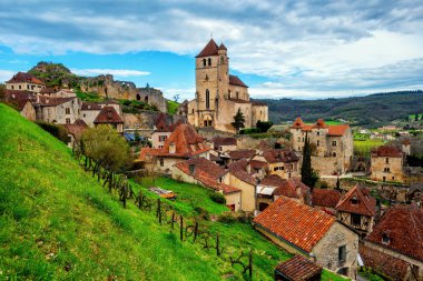 Medieval old town center of Saint-Cirq-Lapopie, one of the most beautiful villages of France (Les Plus Beaux Villages) and a popular tourist destination by Cahors clipart