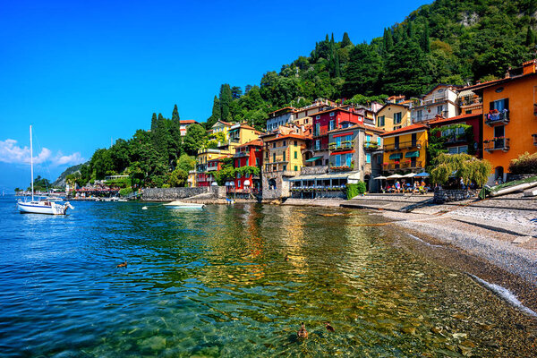 Colorful houses on a beach in Varenna, a famous resort town on Lake Como, Italy