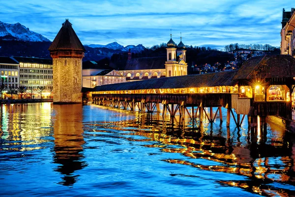 Lucerne, Switzerland, the Old town and Chapel bridge in the late — Stock Photo, Image