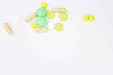 Beyaz tıp tablet-ilaç Light Beyaz arka plan üzerinde dağınık yakından korumak uyuşturucu plastik zip torba için tıp, eczacılık, sağlık kavramı.