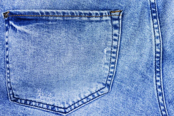 Denim background, close-up of jeans pockets. Faded jeans. — Stock Photo, Image