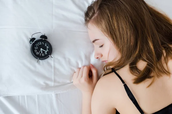 Young Woman Sleep Alarm Clock Pillow Morning Sleeping Girl Alarmclock — Stock Photo, Image