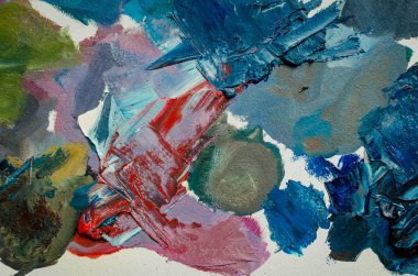 Doku, farklı renklerde karışık yağlı boya. Tuvale elle çizilmiş yağlı boya resim. Soyut arkaplan. Sanat eserinin bir parçası. Noktalar ve fırça darbeleri. Modern çağdaş sanat. Üst Manzara. Boşluğu kopyala.