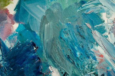 Doku, farklı renklerde karışık yağlı boya. Tuvale elle çizilmiş yağlı boya resim. Soyut arkaplan. Sanat eserinin bir parçası. Noktalar ve fırça darbeleri. Modern çağdaş sanat. Üst Manzara. Boşluğu kopyala.