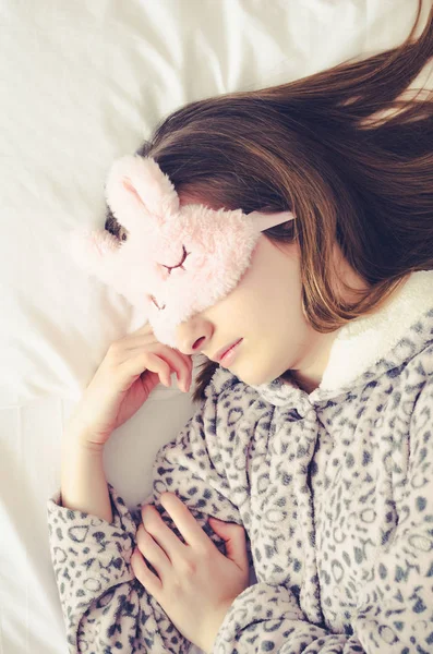 Beautiful Young Woman Cute Sleep Mask Warm Pajamas Lying Bed — Stock Photo, Image