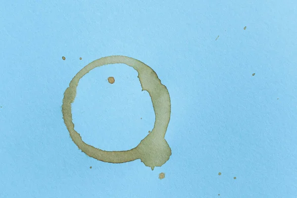 Coffee stains and splashes on blue — Stock Photo, Image