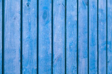 Arkaplan resmi - uzaklığa doğru uzanan açık mavi ahşap bir çit.