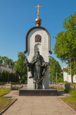 KALYAZIN, RUSSIA, June 07, 2020: Monument to St. Macarius Kalyazinsky stands on the banks of the Volga. The inscription in the Old Slavonic language 