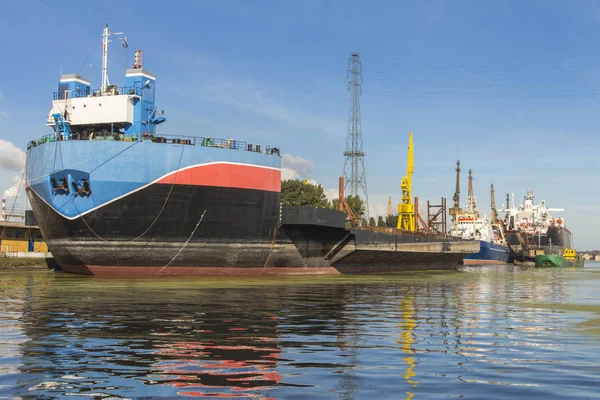 Huge merchant ships in the port of Gdansk. Poland