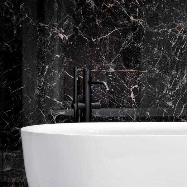 Close Luxury White Bathtub Modern Black Tap Dark Marble Wall — Stock Photo, Image