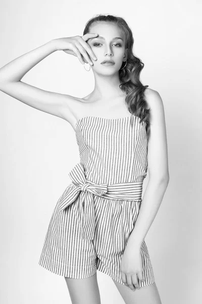 Teen girl posing in studio on white background. Black and white — Stock Photo, Image